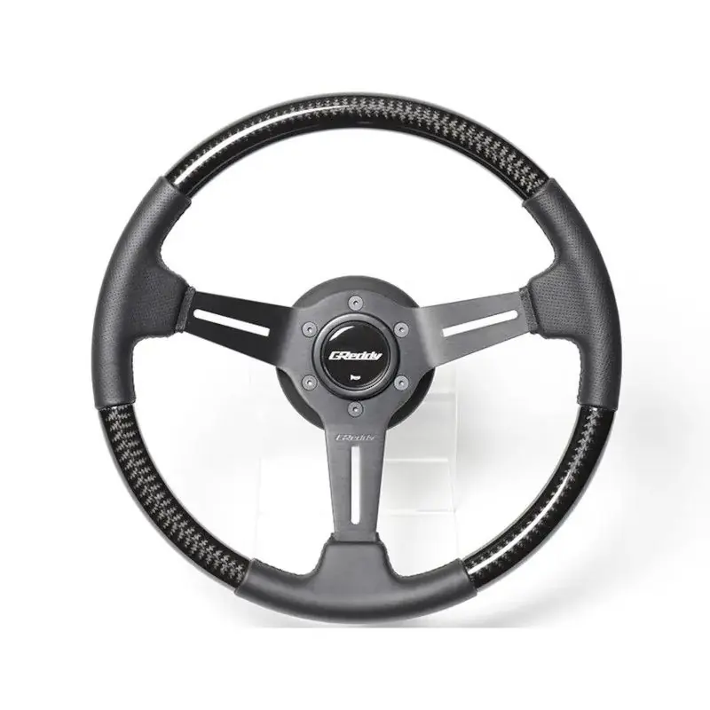 Kup online GReddy Sports "Real Carbon" Steering Wheel (47 mm Dish), Black Spokes - 340 mm 16600007 - FMIC